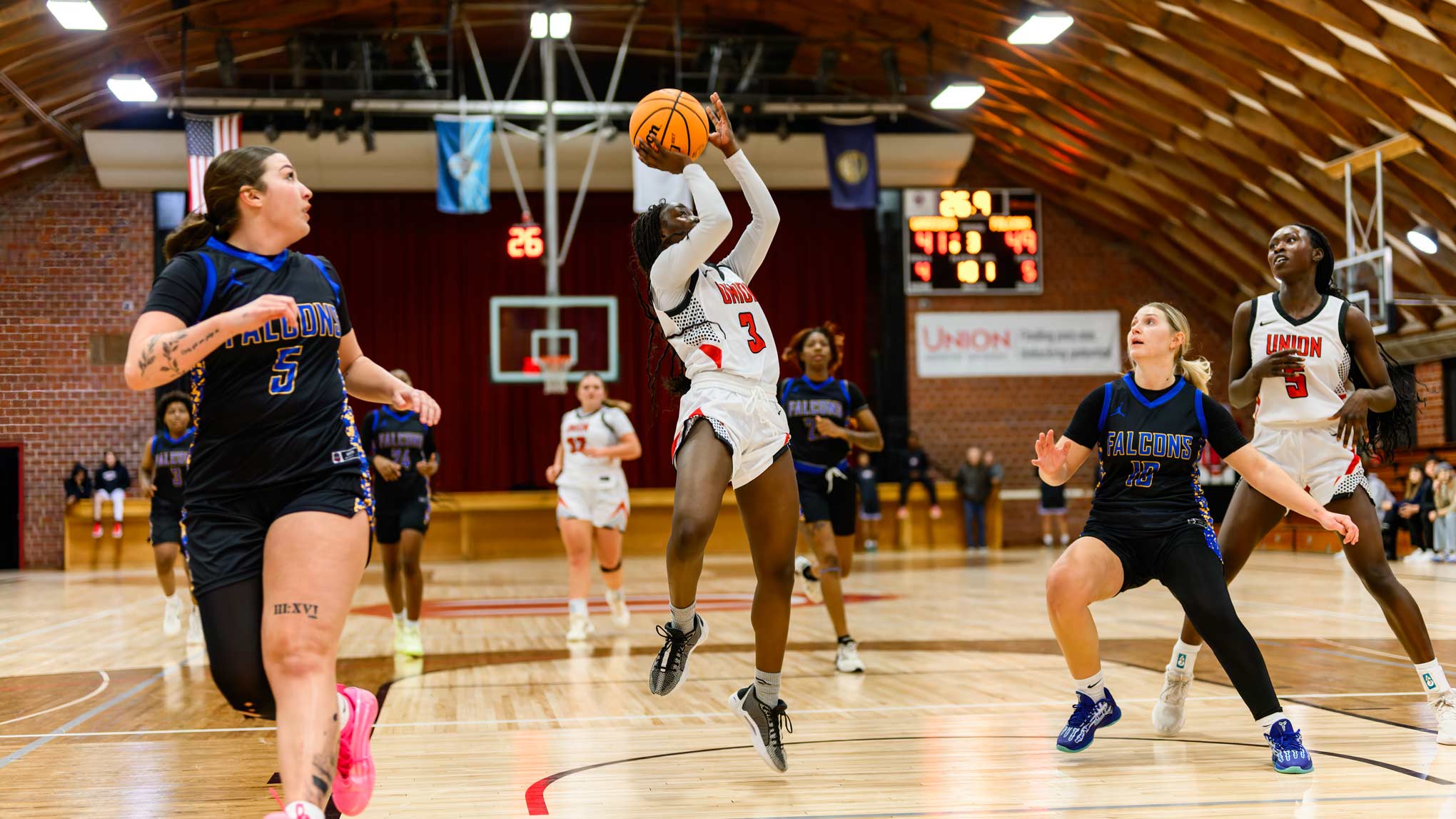 Michelle Morara shoots a basket.